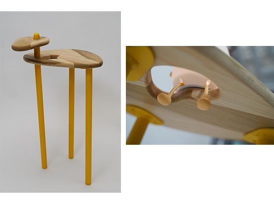 A small bedside table with two levels and a hole in the middle fit for a squishy friend