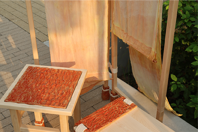 Downward angle of part of Sunware Set furniture set in the sunset light